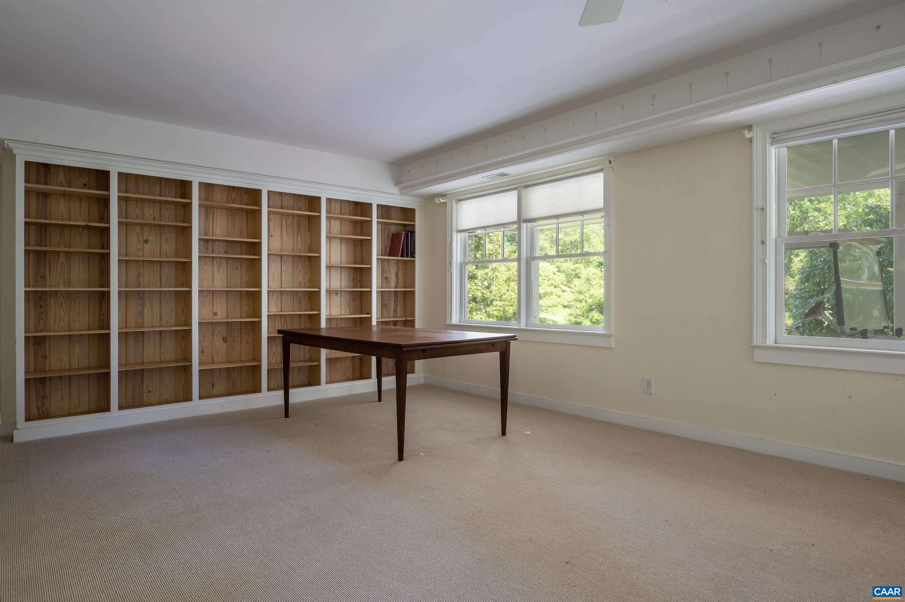 2845 Earlysville Road Earlysville, VA 22936 - Photo 23 of 35 a view of a room with windows and lounge chair
