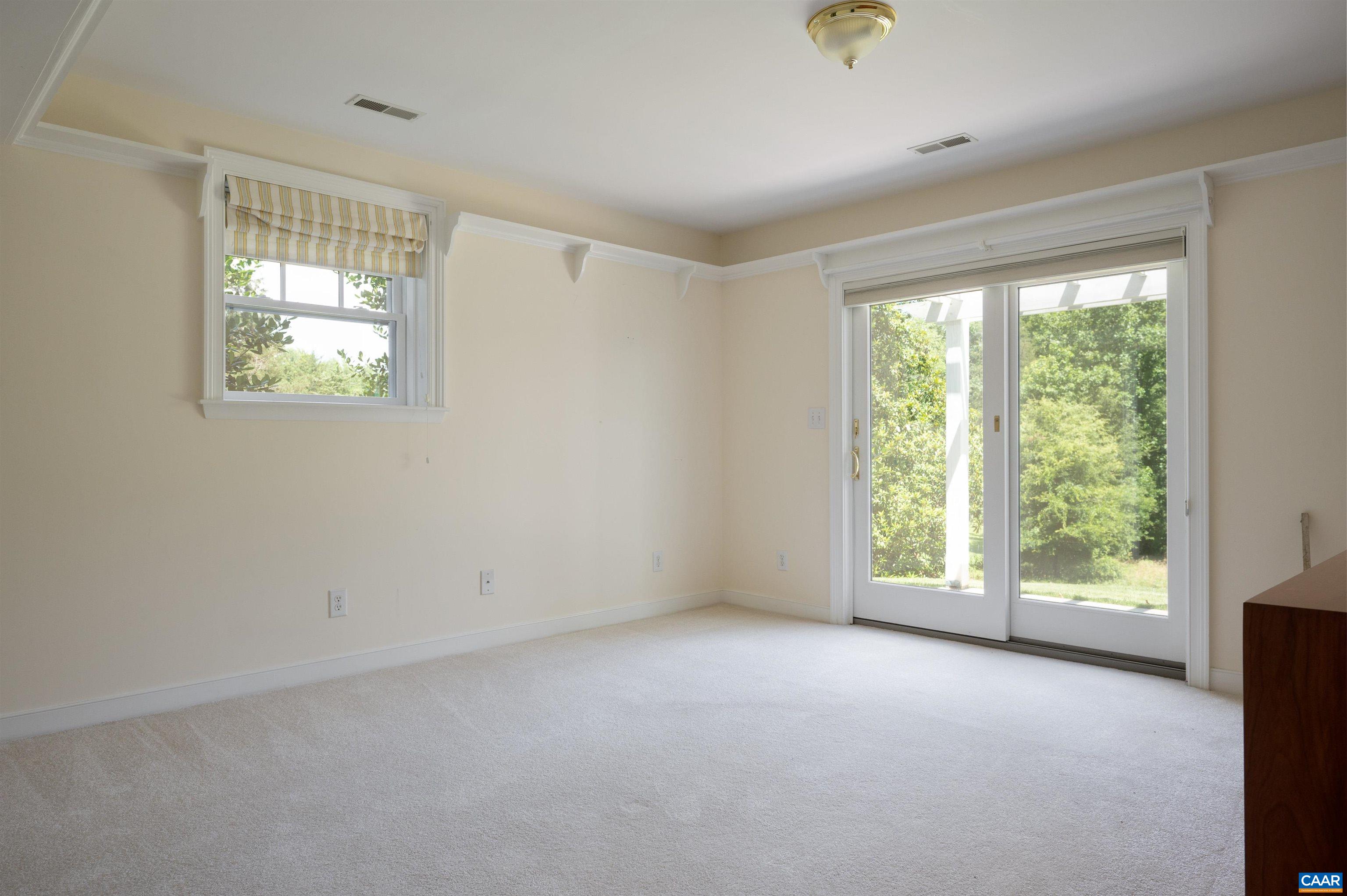 2845 Earlysville Road Earlysville, VA 22936 - Photo 25 of 35 a view of an empty room with a window