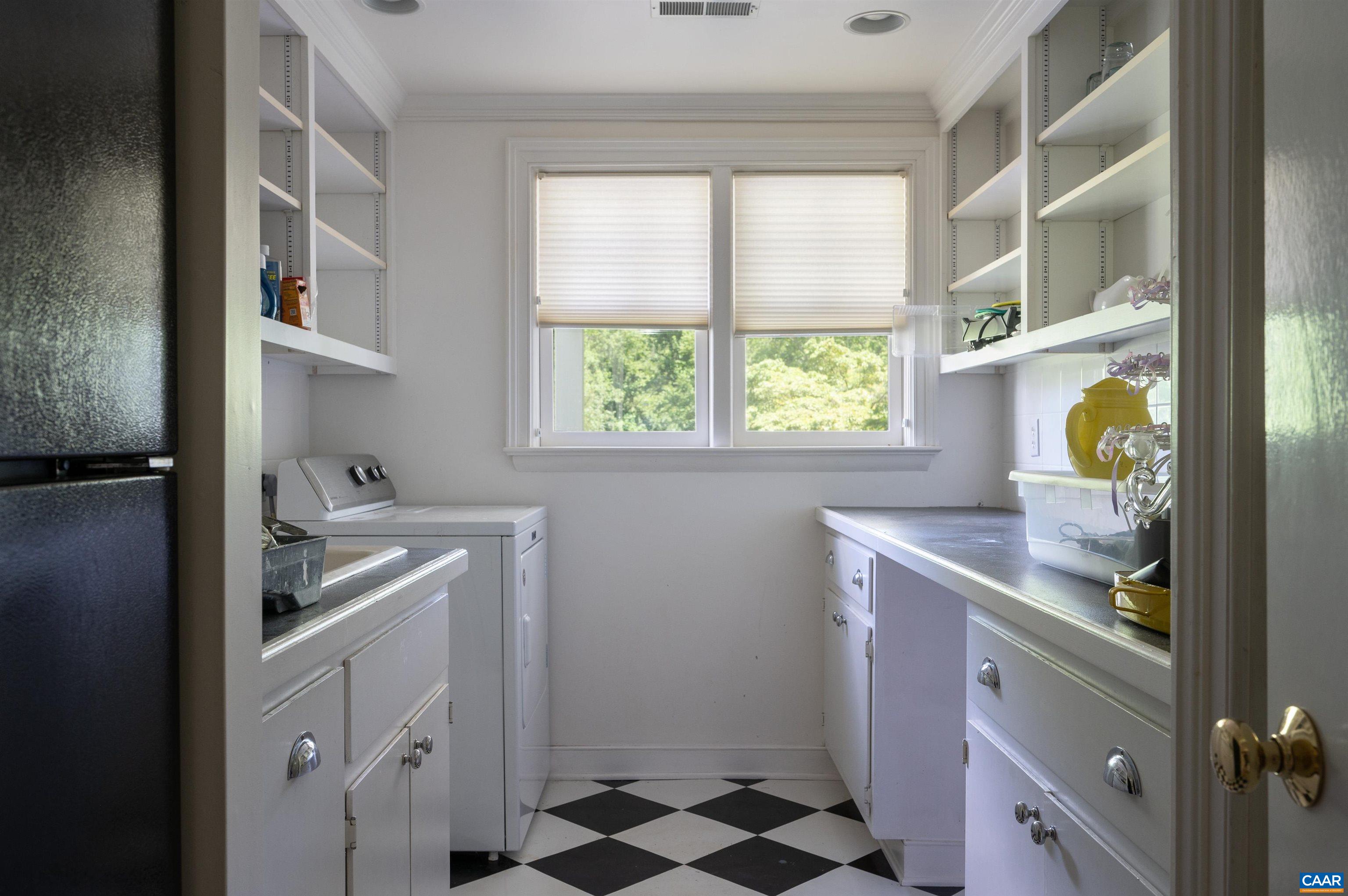 2845 Earlysville Road Earlysville, VA 22936 - Photo 28 of 35 a kitchen with stainless steel appliances granite countertop a sink and a cabinets