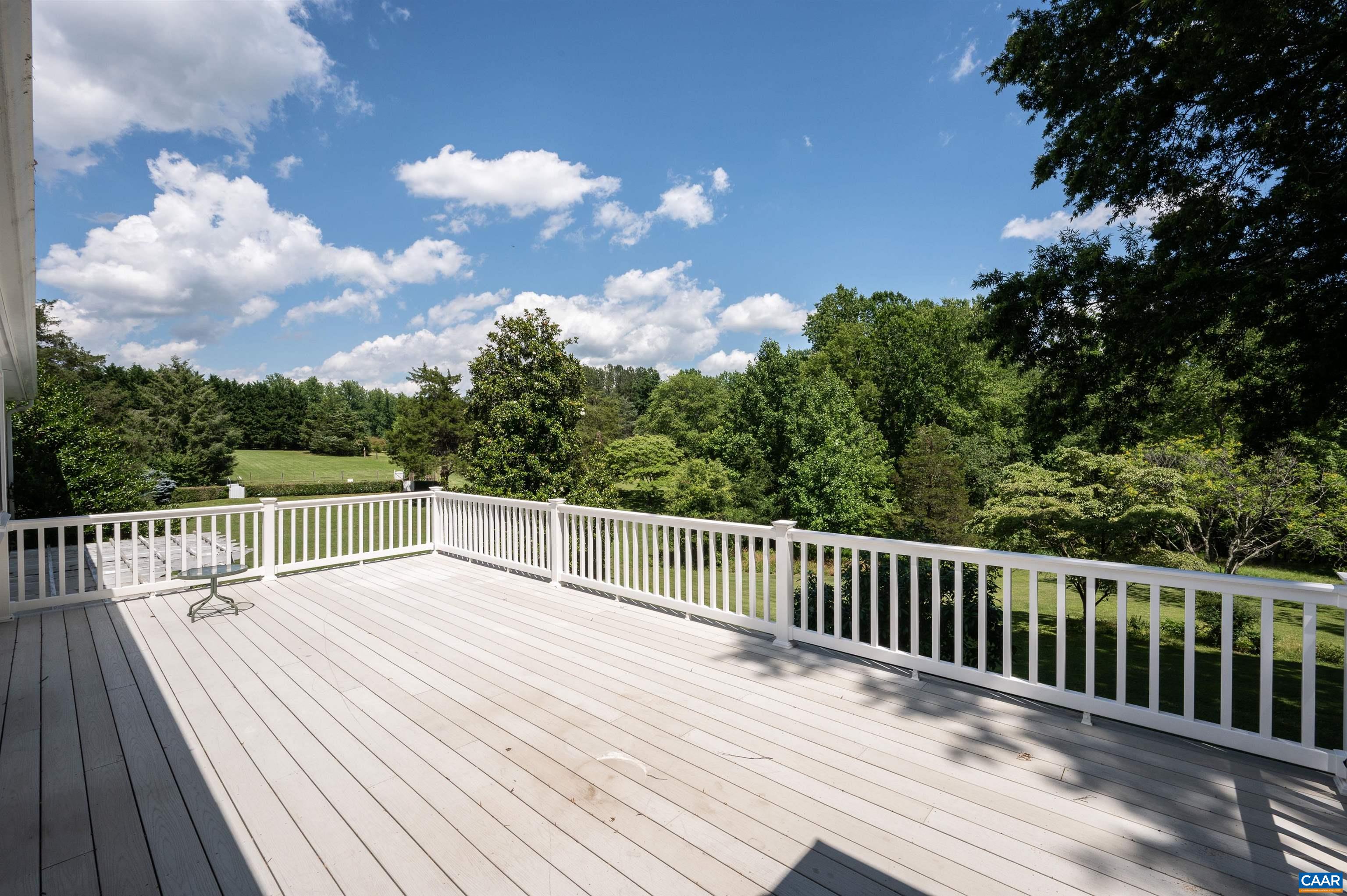 2845 Earlysville Road Earlysville, VA 22936 - Photo 29 of 35 a balcony with wooden floor and fence