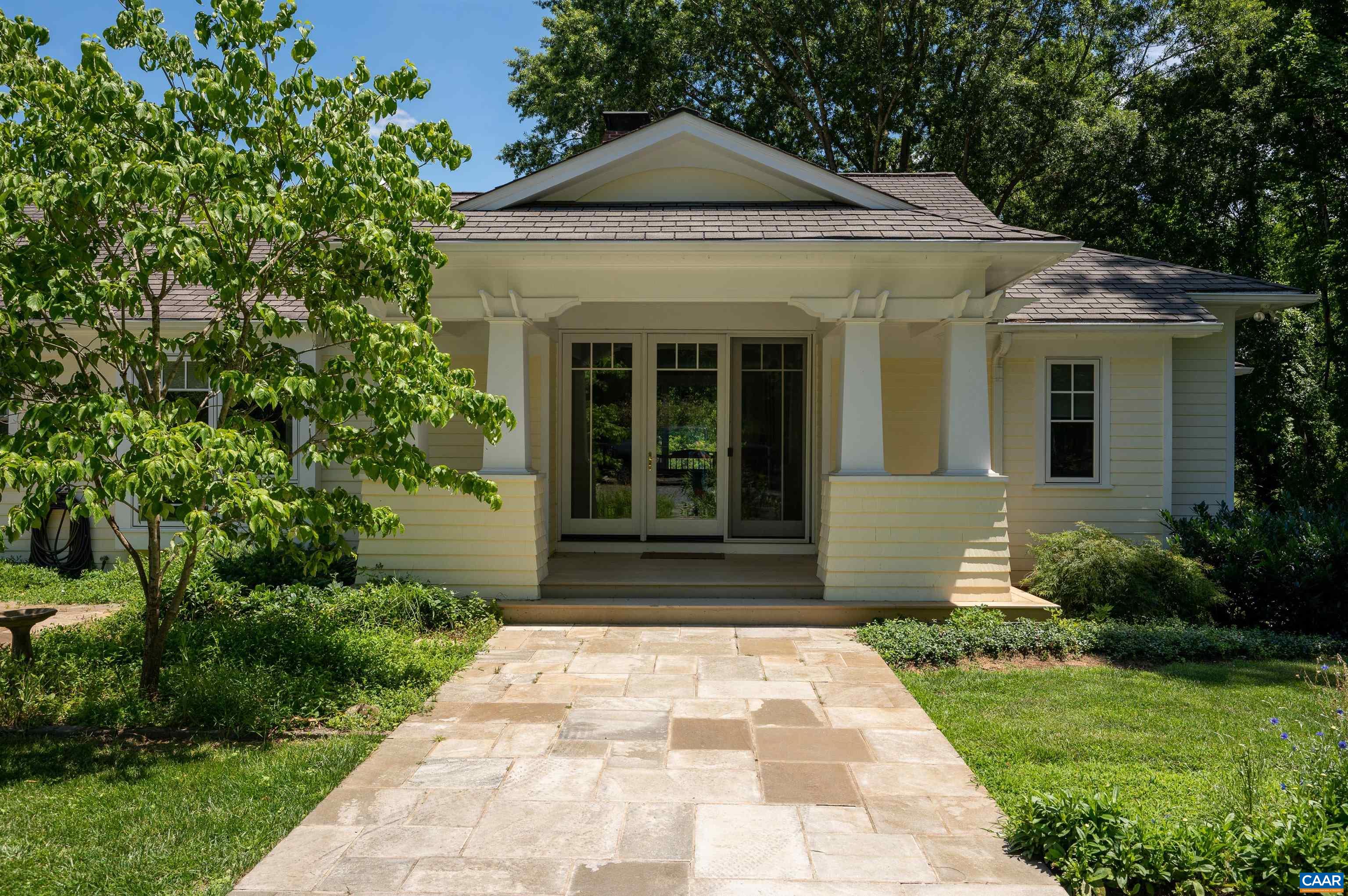 2845 Earlysville Road Earlysville, VA 22936 - Photo 3 of 35 a front view of a house with garden