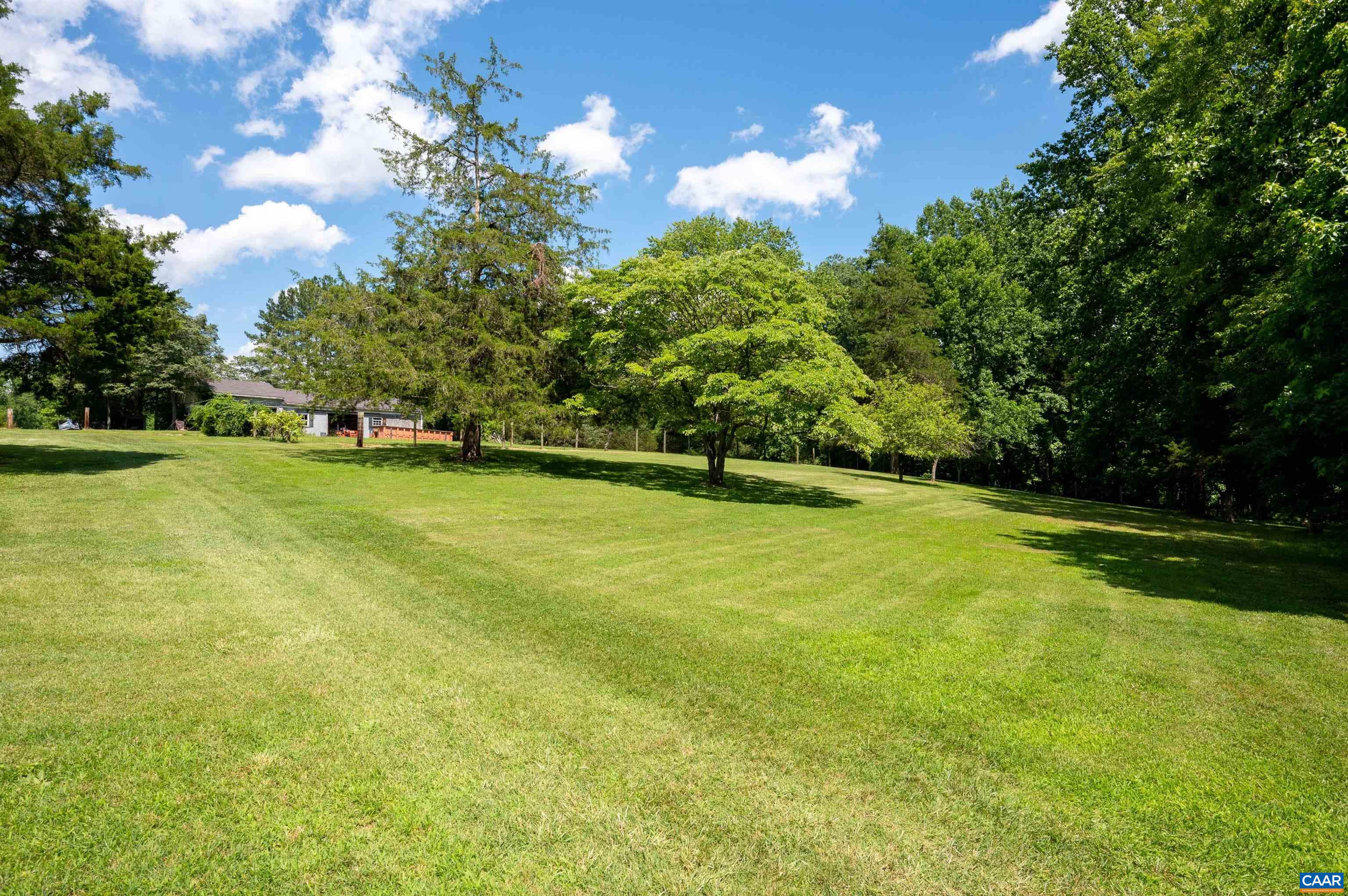 2845 Earlysville Road Earlysville, VA 22936 - Photo 34 of 35 a view of a golf course with a garden