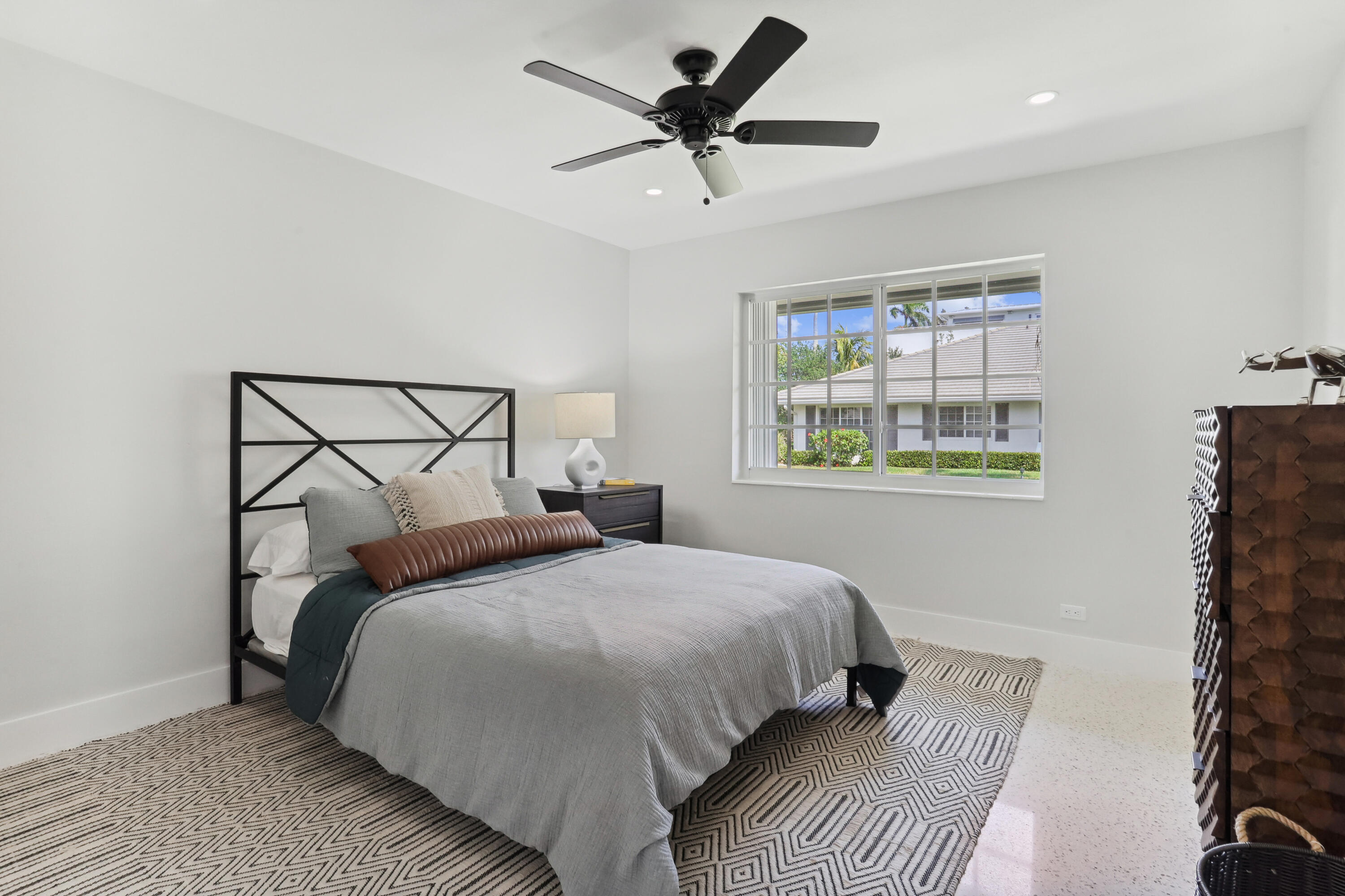 1004 Langer Way Delray Beach, FL 33483 - Photo 13 of 19 a bedroom with bed and a window