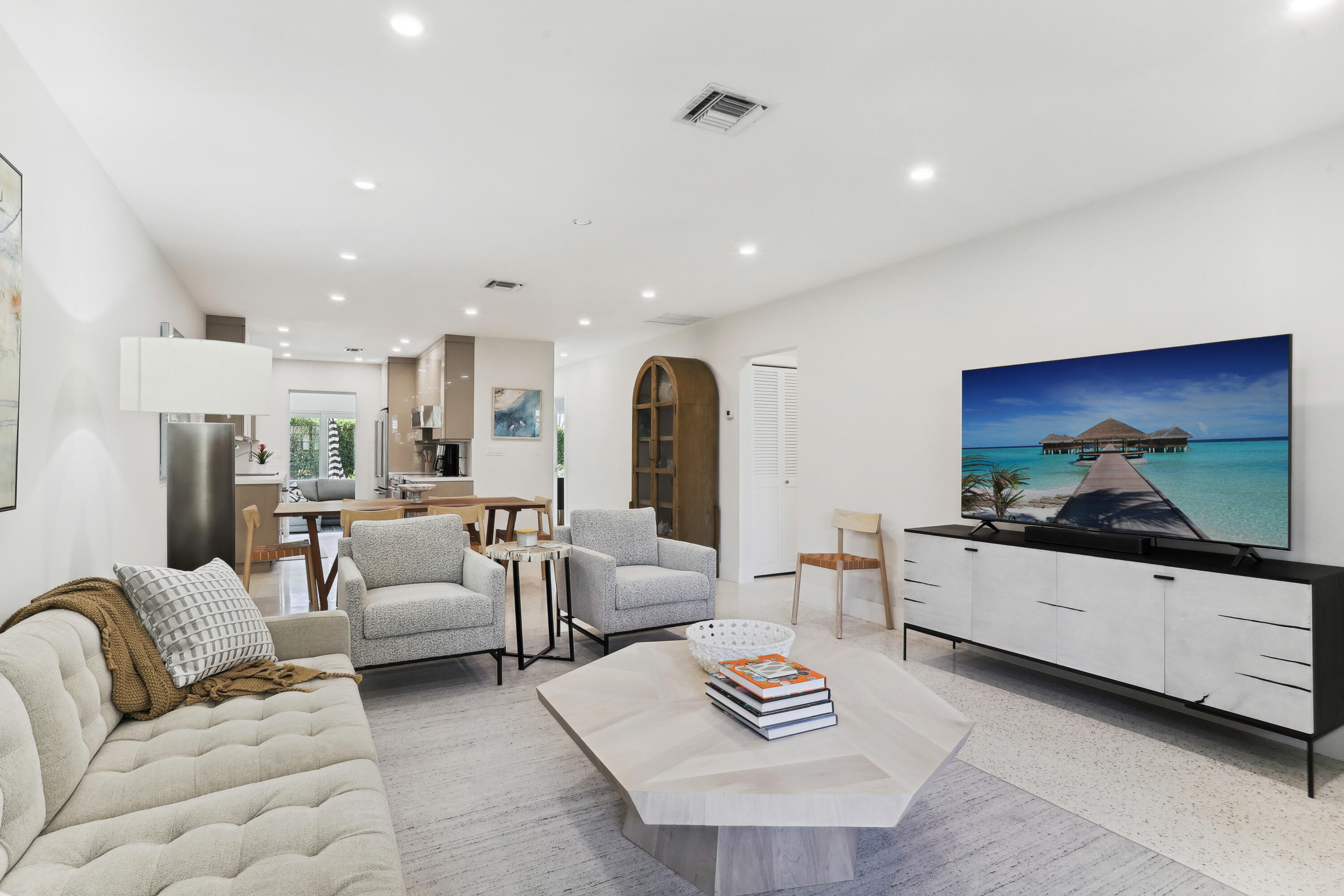 1004 Langer Way Delray Beach, FL 33483 - Photo 5 of 19 a living room with furniture and a flat screen tv