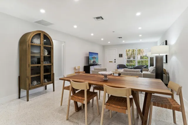 a view of a dining room with furniture