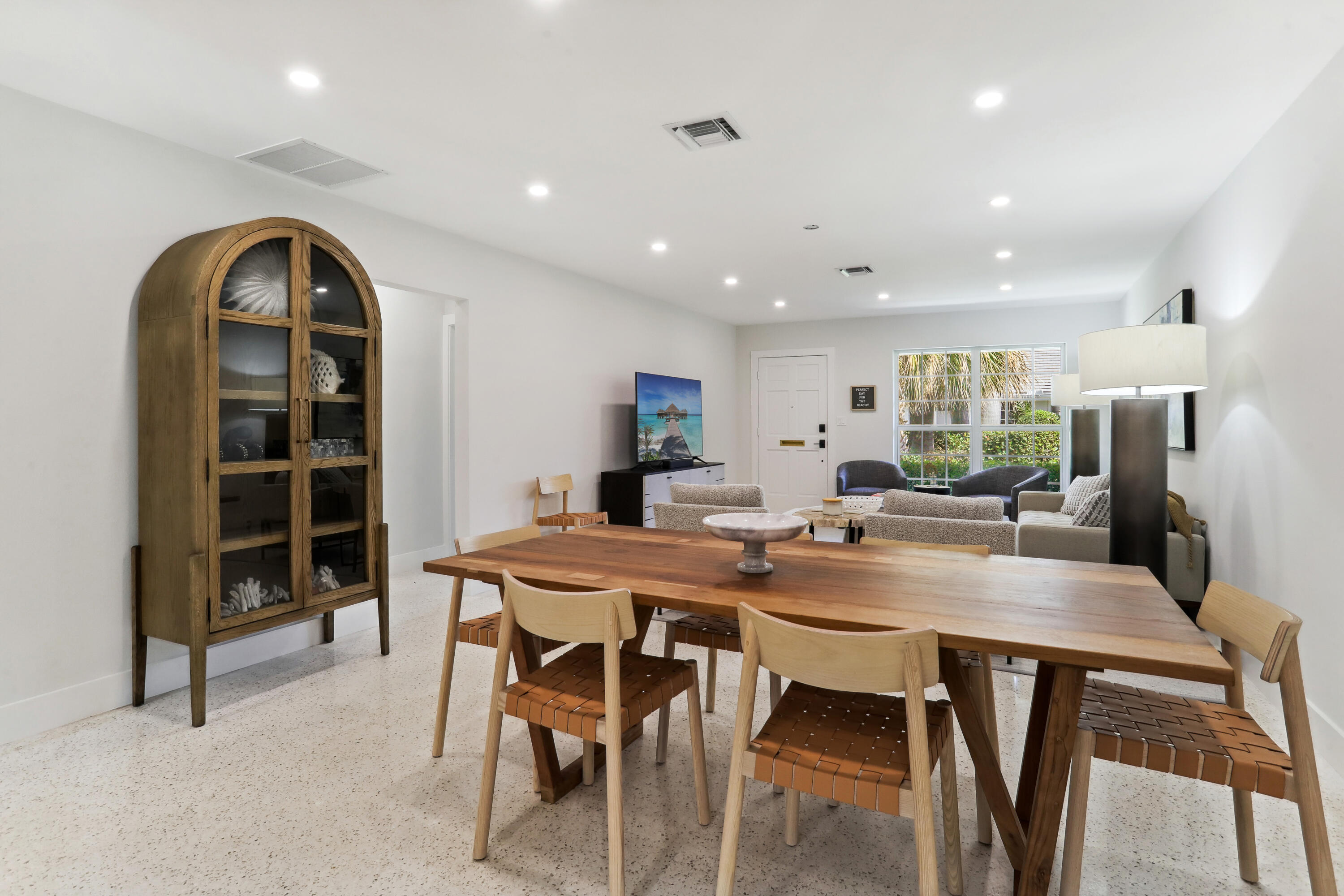 1004 Langer Way Delray Beach, FL 33483 - Photo 6 of 19 a view of a dining room with furniture
