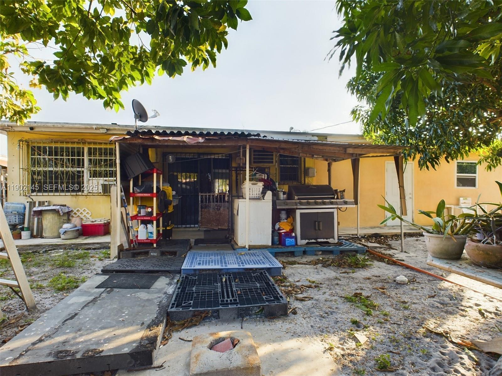 3861 Northwest 177th Street Miami Gardens, FL 33055 - Photo 4 of 15 a front view of a house with porch