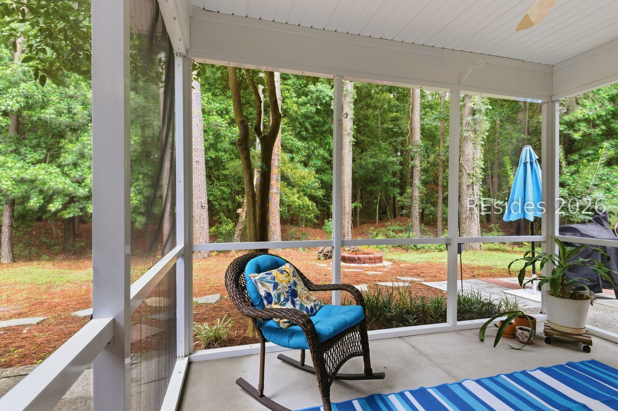 6 Hemlock Court Bluffton, SC 29910 - Photo 37 of 45 Cozy screened porch overlooking firepit.