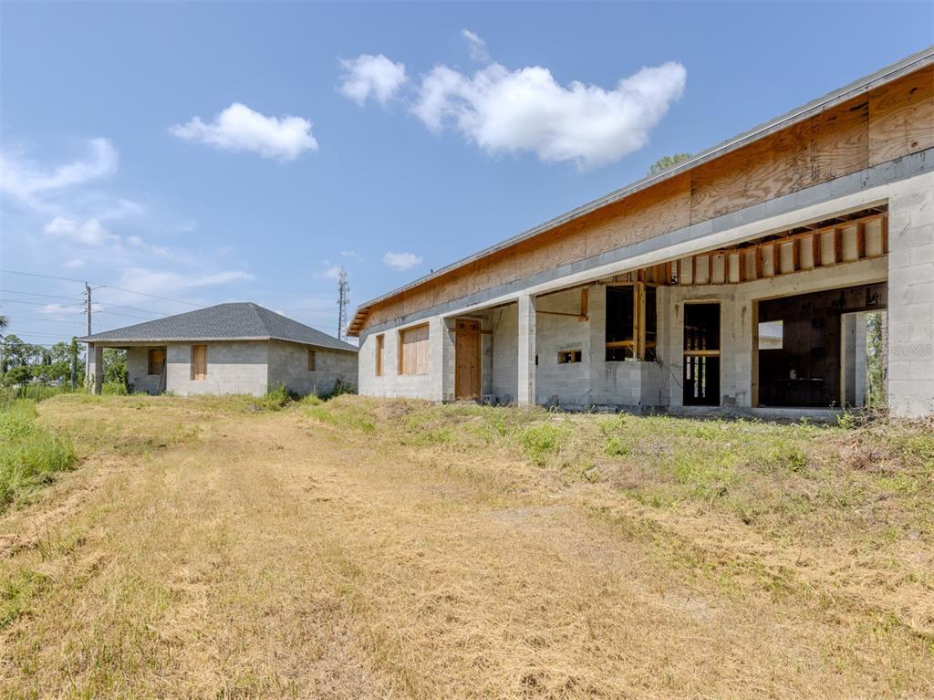 5236 Cromey Road North Port, FL 34288 - Photo 21 of 31 a view of a house with yard and porch