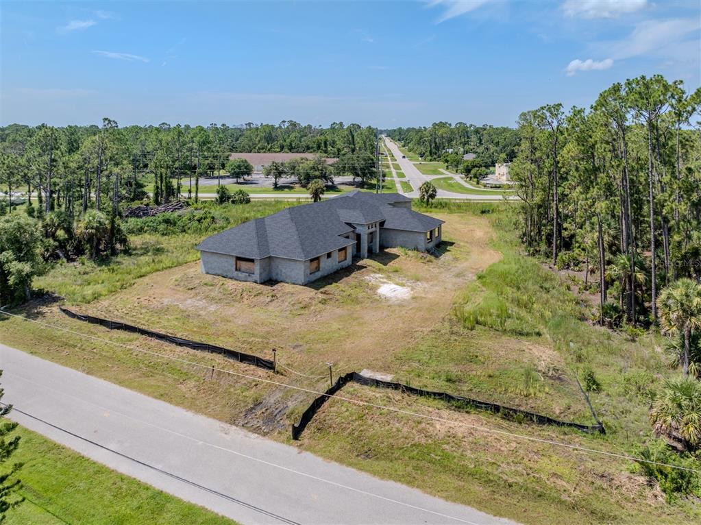5236 Cromey Road North Port, FL 34288 - Photo 24 of 31 a view of a house with a yard