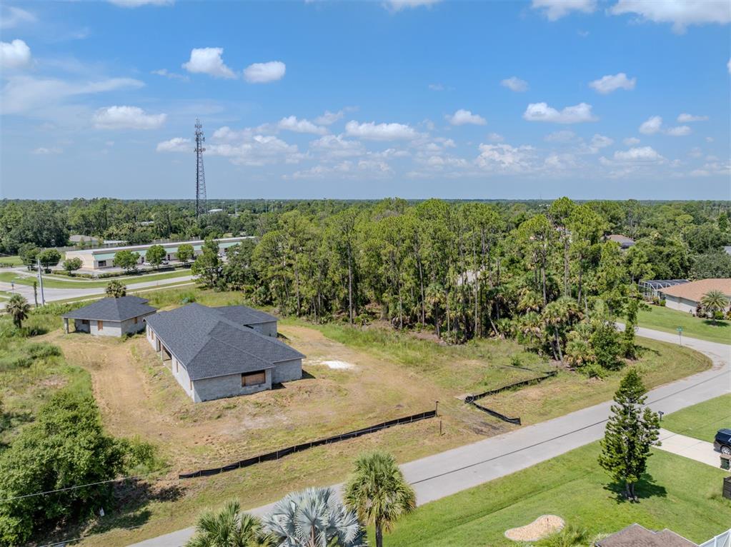 5236 Cromey Road North Port, FL 34288 - Photo 25 of 31 a view of a swimming pool and a yard