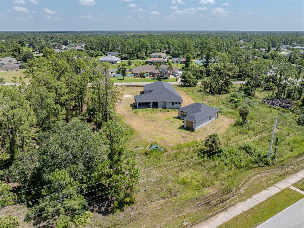 5236 Cromey Road North Port, FL 34288 - Photo 31 of 31 an aerial view of residential houses with outdoor space and trees