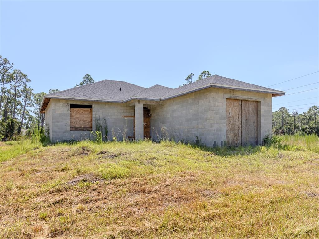 5236 Cromey Road North Port, FL 34288 - Photo 4 of 31 a view of a house with a yard