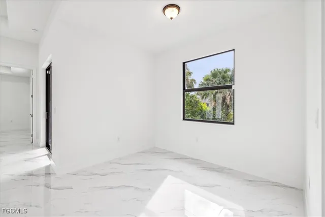 an empty room with windows