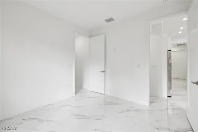 an empty room with an entryway