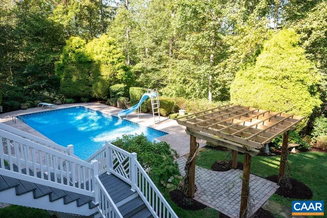 a view of a park with large trees