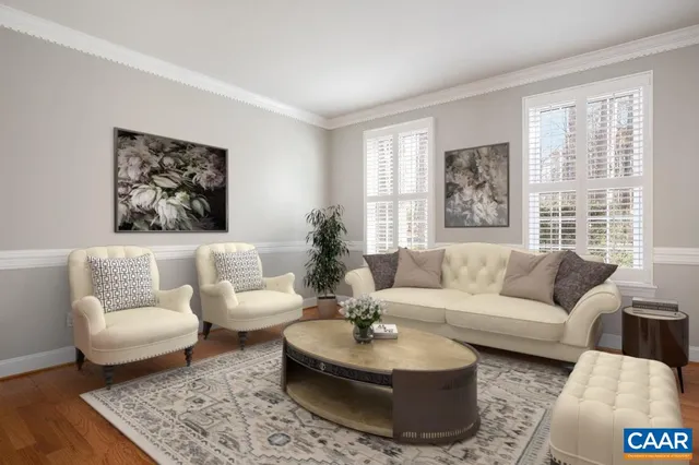 a kitchen with stainless steel appliances kitchen island granite countertop a stove a sink a refrigerator and a microwave