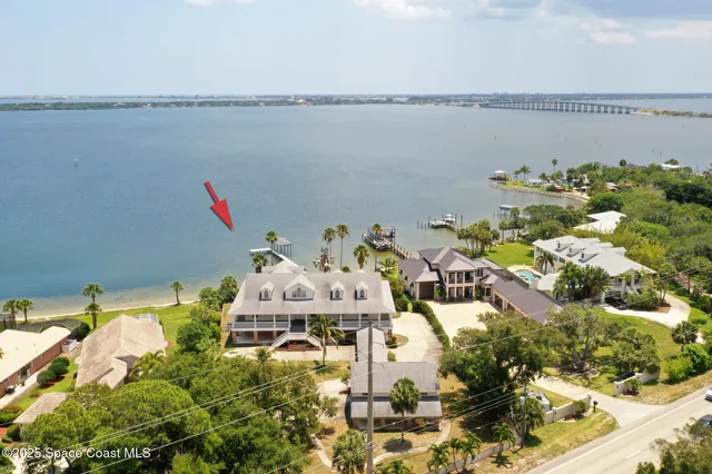 a terrace with outdoor seating and city view