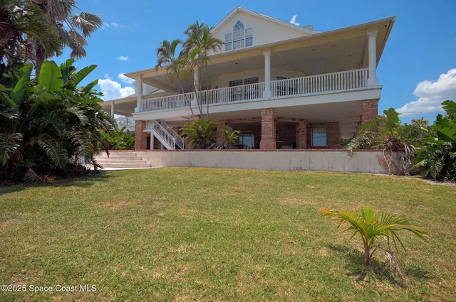 a view of balcony with wooden floor