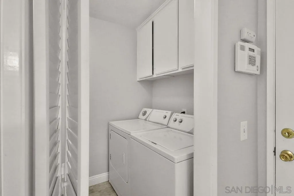 911 Kilmarnock Way Riverside, CA 92508 - Photo 9 of 54 a utility room with dryer and washer