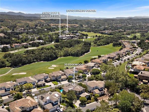 an aerial view of a city with lots of residential buildings