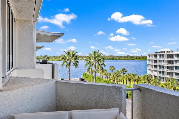 a kitchen with a sink cabinets and appliances