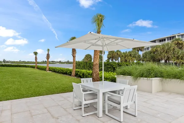 a view of a balcony with chairs