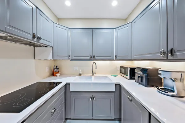 a bedroom with a bed and a chair