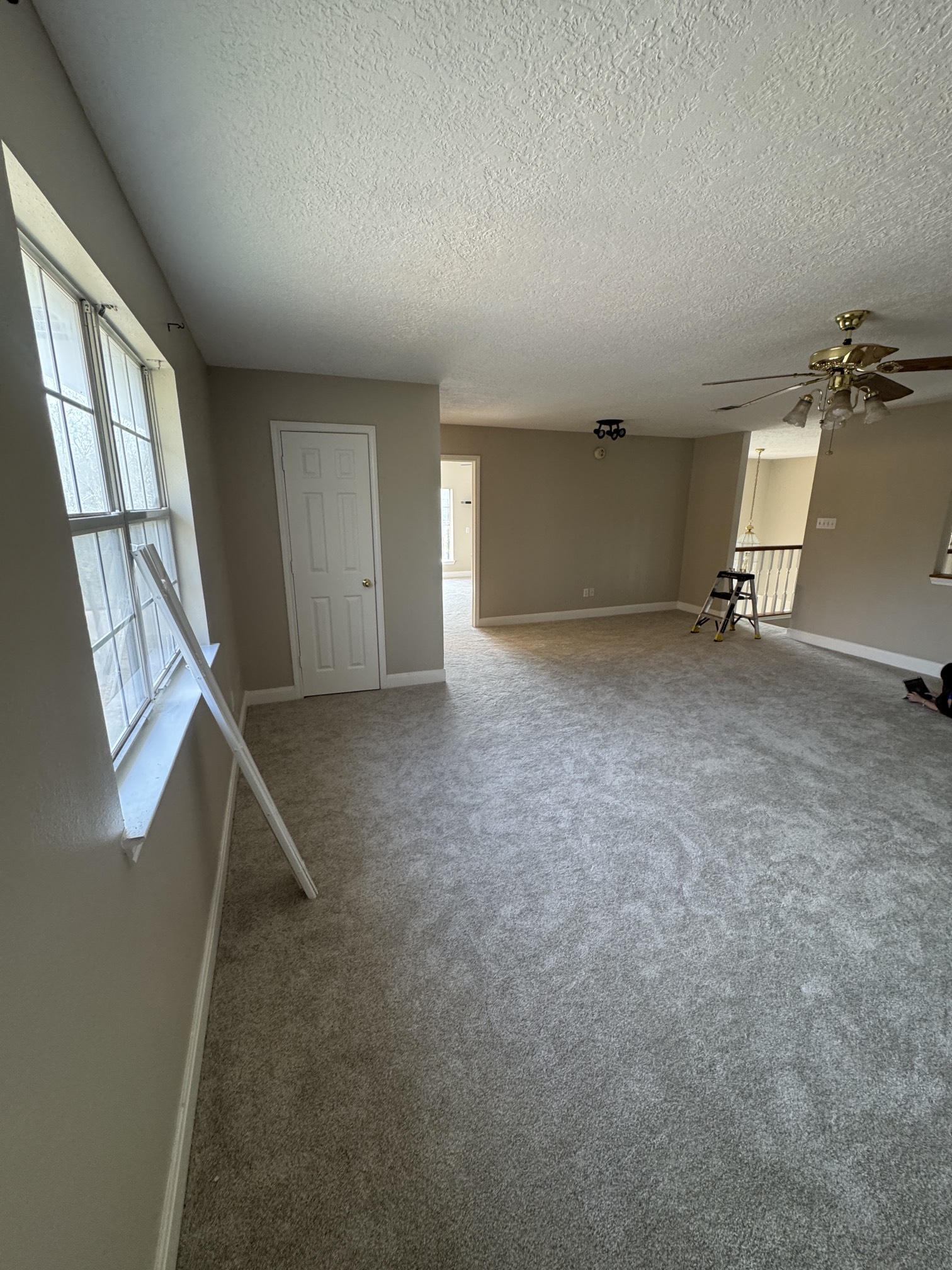 201 Pebble Springs Lane Cleveland, TX 77327 - Photo 21 of 27 an empty room with windows