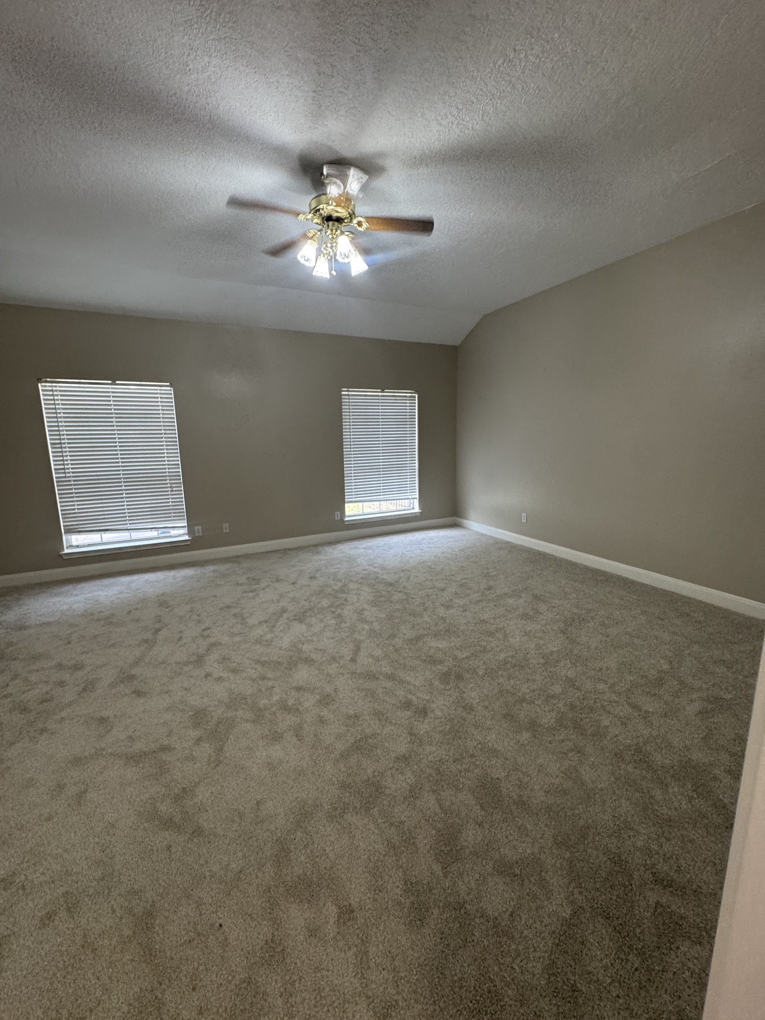 201 Pebble Springs Lane Cleveland, TX 77327 - Photo 25 of 27 a view of an empty room with a window
