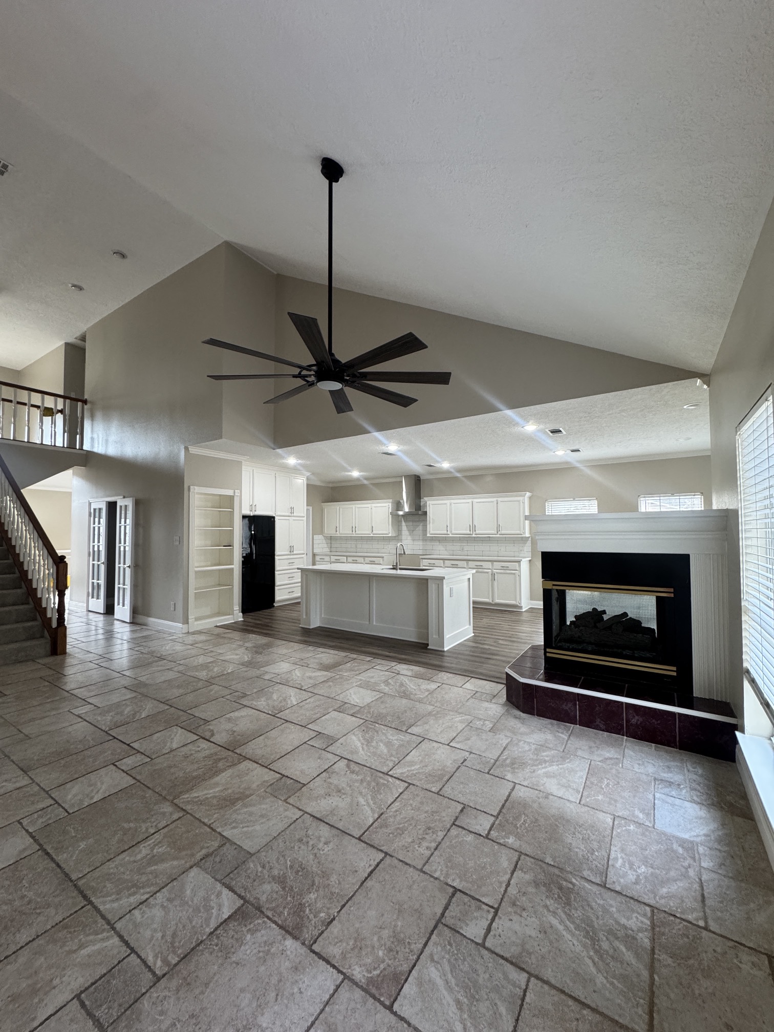 201 Pebble Springs Lane Cleveland, TX 77327 - Photo 6 of 27 a view of a fireplace in a room