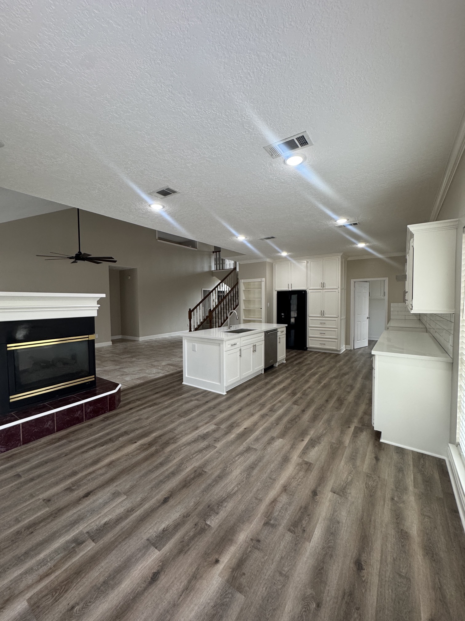 201 Pebble Springs Lane Cleveland, TX 77327 - Photo 8 of 27 a view of kitchen with furniture and flat screen tv