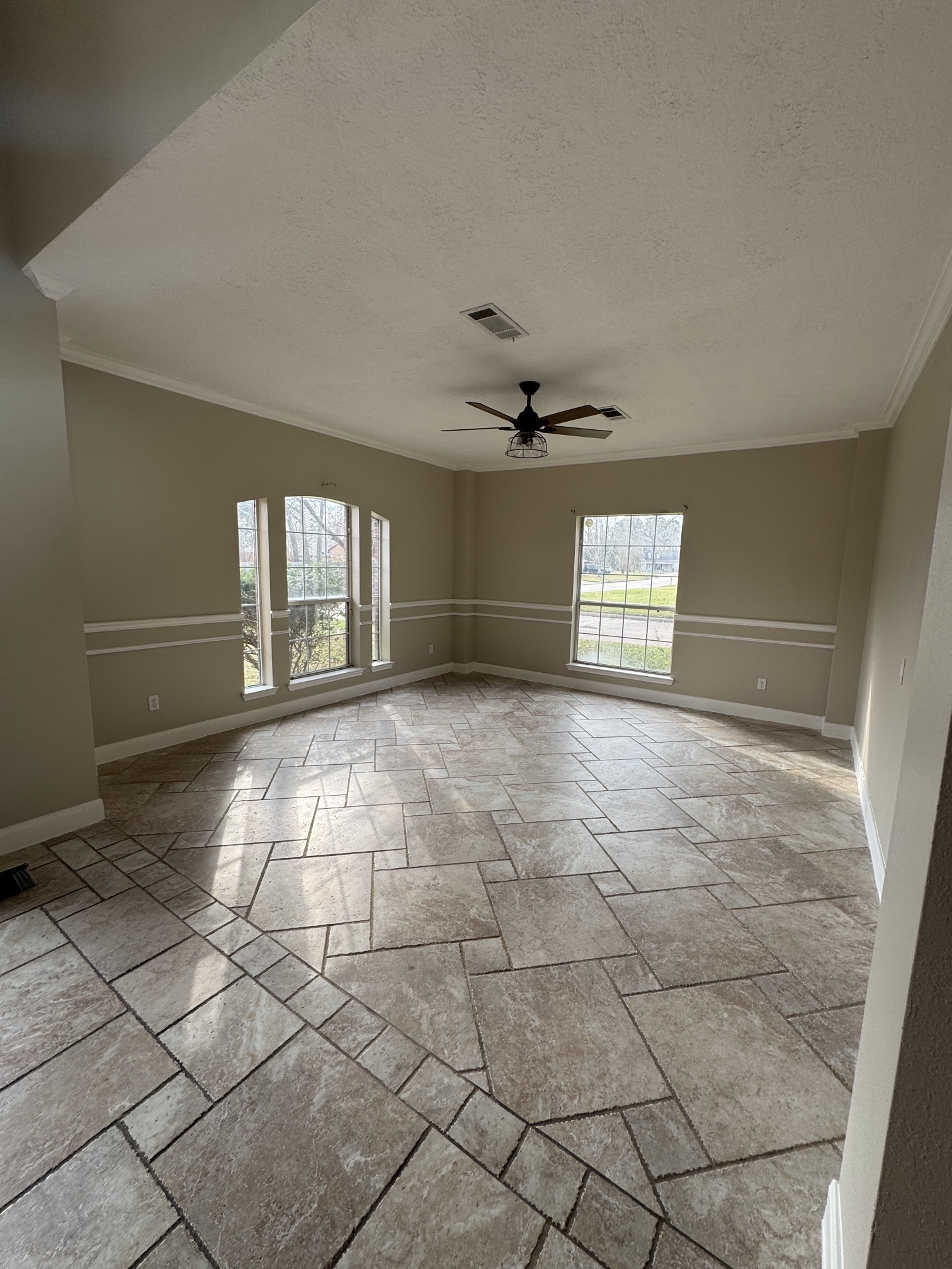 201 Pebble Springs Lane Cleveland, TX 77327 - Photo 9 of 27 a view of an empty room and window