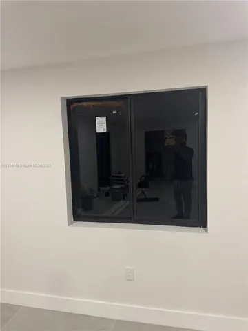 an empty room with an entryway