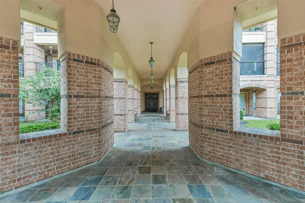 a view of front door of house with stairs