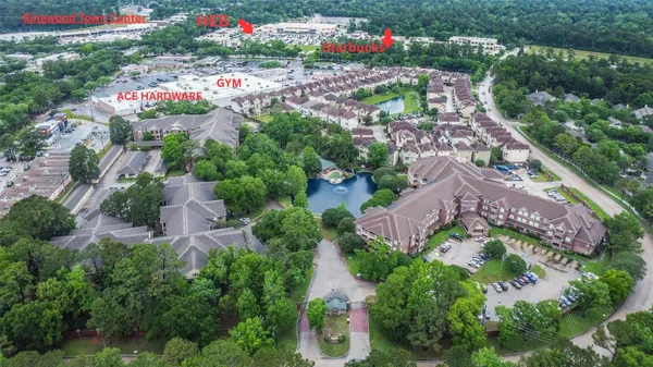 an aerial view of residential house with an outdoor space and street view