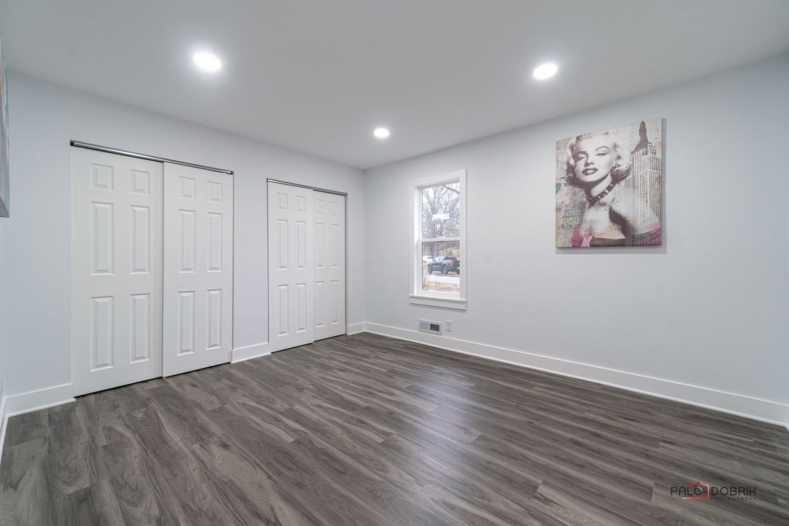 38236 North Lee Avenue Spring Grove, IL 60081 - Photo 13 of 25 a view of an empty room with wooden floor
