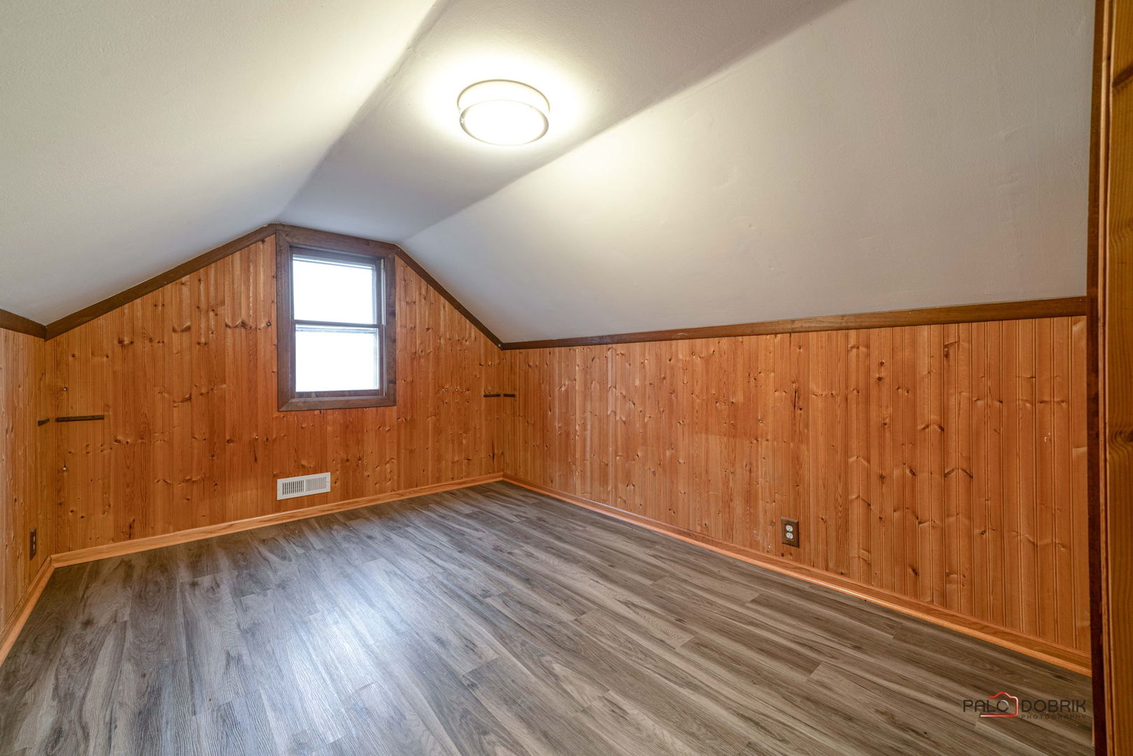 38236 North Lee Avenue Spring Grove, IL 60081 - Photo 16 of 25 an empty room with wooden floor and windows