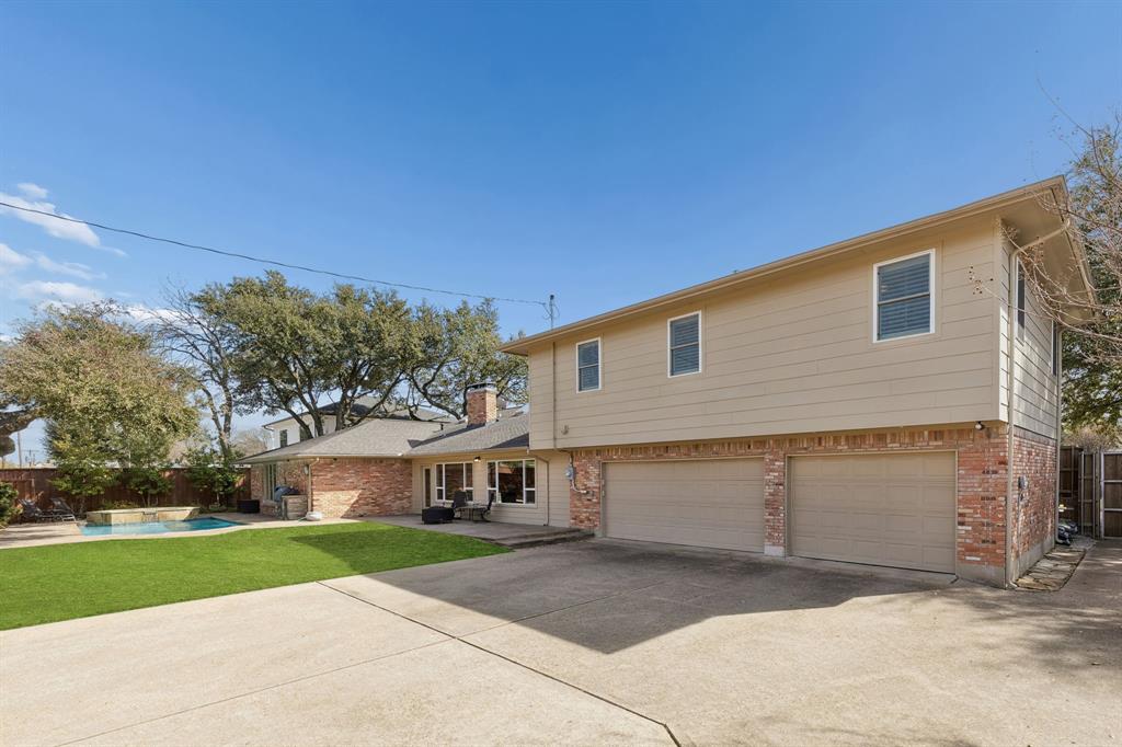 4475 Twin Post Road Dallas, TX 75244 - Photo 10 of 10 a view of a house with a yard and large tree
