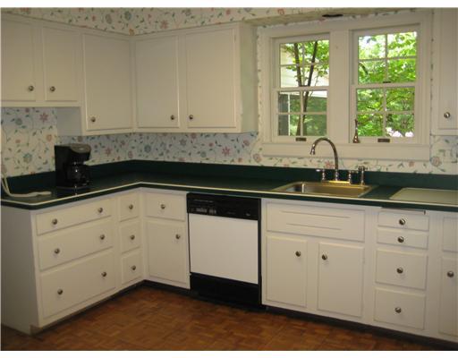114 White Gate Road Pittsburgh, PA 15238 - Photo 3 of 18 Kitchen. Eat-in kitchen with white cabinetry, pantry and an abundance of counterspace and cabinetry.