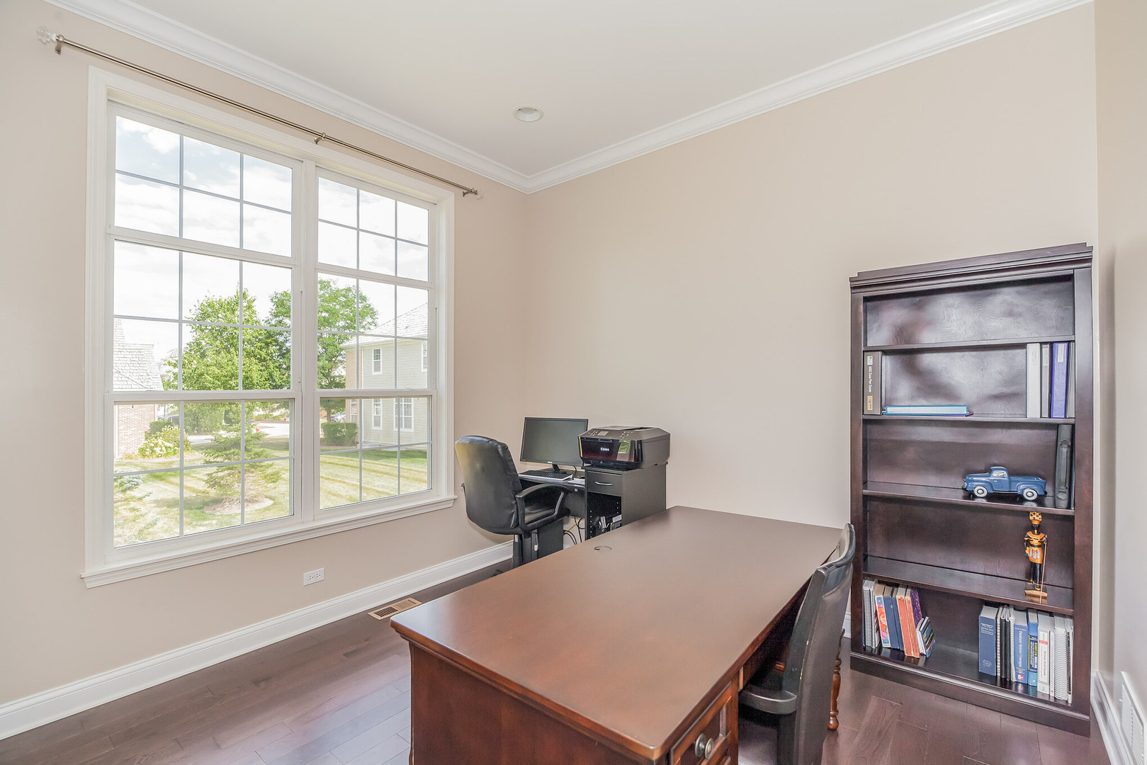 1115 Ashley Lane Inverness, IL 60010 - Photo 17 of 50 a view of a room with furniture and a window