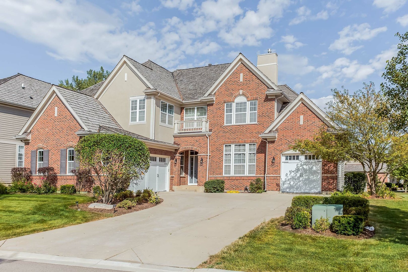 1115 Ashley Lane Inverness, IL 60010 - Photo 2 of 50 a front view of a house with a yard