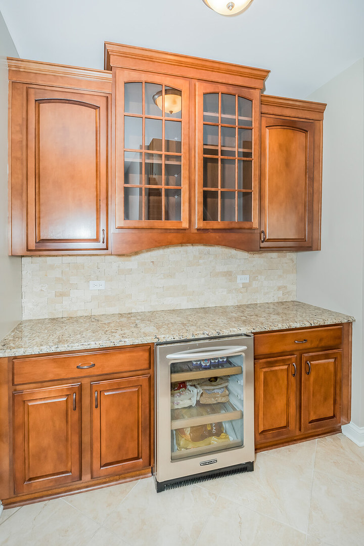 1115 Ashley Lane Inverness, IL 60010 - Photo 23 of 50 a stove top oven sitting inside of a kitchen