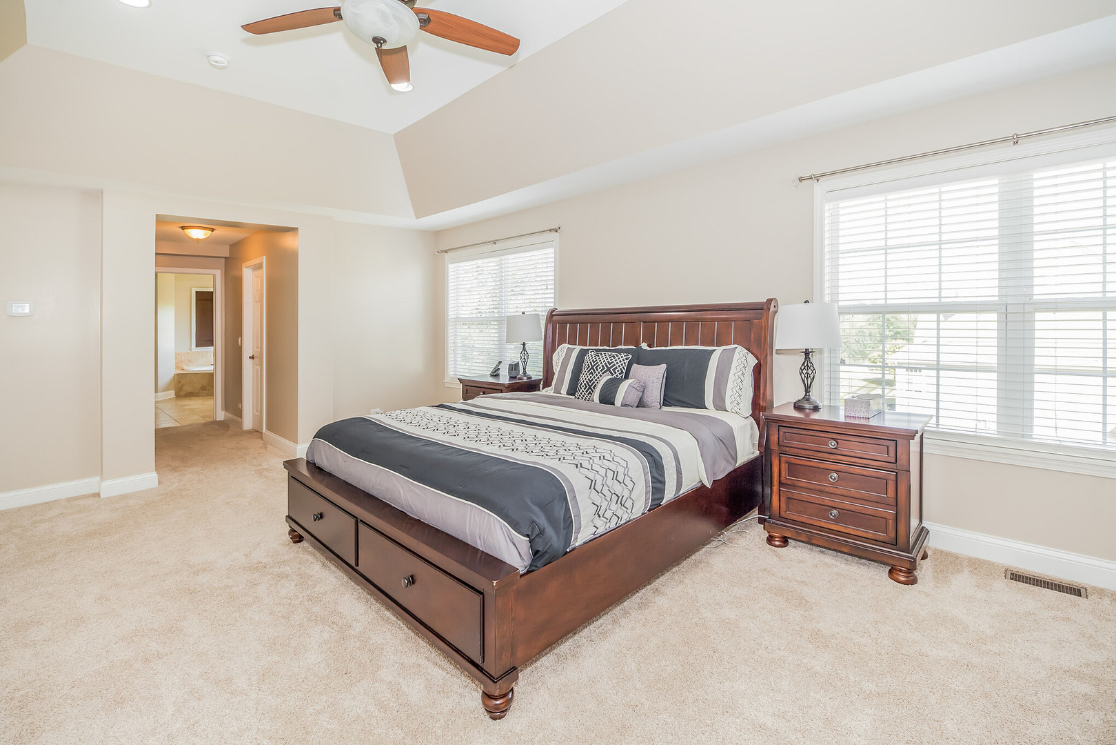 1115 Ashley Lane Inverness, IL 60010 - Photo 29 of 50 a bedroom with a bed and windows