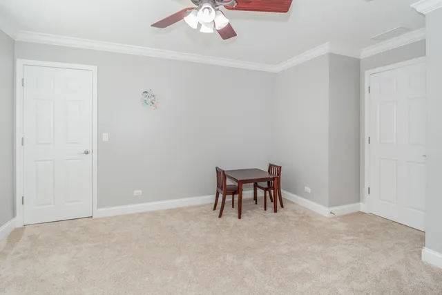 a view of table and chair in room