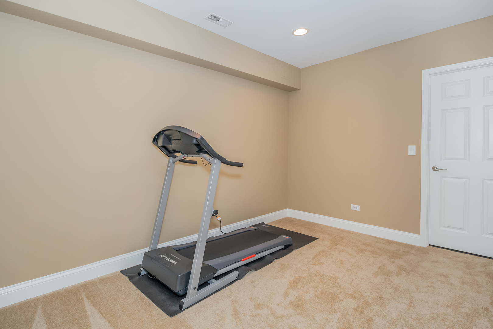 1115 Ashley Lane Inverness, IL 60010 - Photo 43 of 50 a room with gym equipment