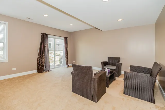 a view of workspace with furniture and a window