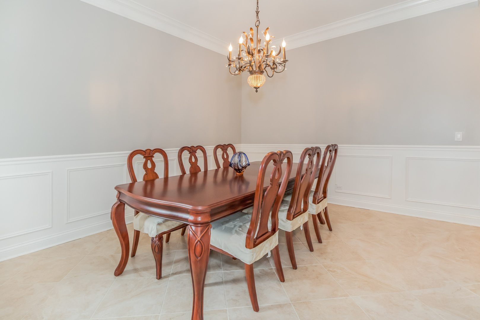 1115 Ashley Lane Inverness, IL 60010 - Photo 10 of 50 a view of a dining room with furniture and chandelier