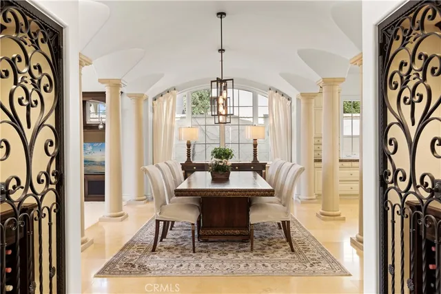 a view of a living room and entry way