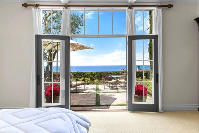 a living room with furniture rug and window